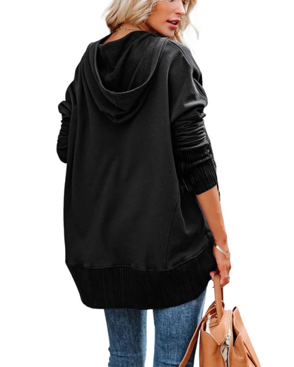 Pulover cu mâneci lungi, croi larg, decolteu în V și nasturi