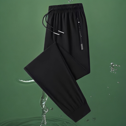 Pantaloni unisex impermeabili și elastici 